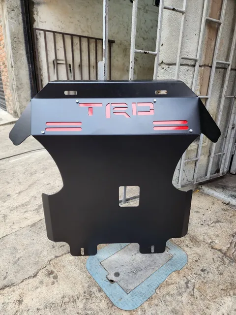 Protector de cárter — trabajo realizado por A&T